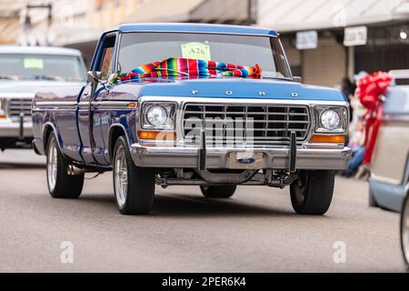 Brownsville, Texas, USA - February 26, 2022: Charro Days Grand International Parade, a group of Classic Ford trucks part of the parade Stock Photo