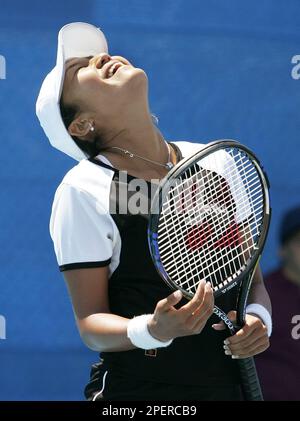 Japan's Akiko Morigami reacts after a point during her first round tennis match against Iveta Benesova of Czech Republic at the 2004 Olympic Games in Athens Monday, Aug. 16, 2004. Morigami won, 6-1, 6-4. (AP Photo/Elise Amendola)