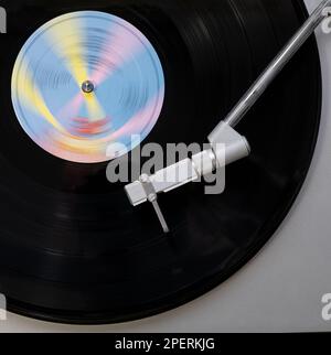 Record player playing a vinyl record. Black platter Stock Photo - Alamy