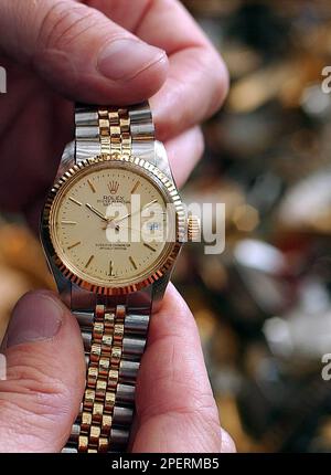 A confiscated counterfeit Rolex is shown in Cressier Switzerland on