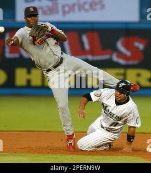 Florida Marlins' shortstop Edgar Renteria prepares to make the throw to  first against the St. Louis Cardinals in Miami Saturday May 25, 1996.(AP  Photo/Jeffrey Boan Stock Photo - Alamy