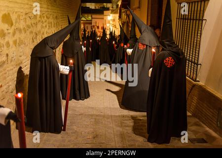 Arahal. Seville. Spain. 15th April, 2022. Penitents of the brotherhood of the Santo Entierro (Holy Burial), from Arahal (Seville), during the processi Stock Photo