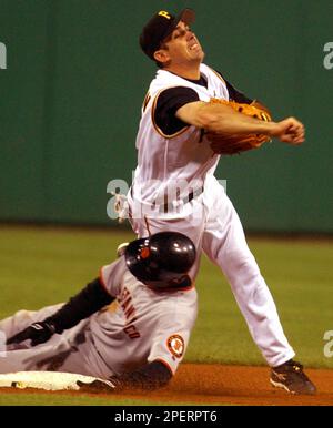 Pittsburgh Pirates pinch hitter Michael Chavis (2) hits an RBI double  against the Boston Red Sox during the sixth inning of a baseball game,  Thursday, Aug. 18, 2022, in Pittsburgh. (AP Photo/Philip