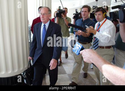 Mark Hacking's attorney Gil Athay, left-wearing blue tie, leaves court ...