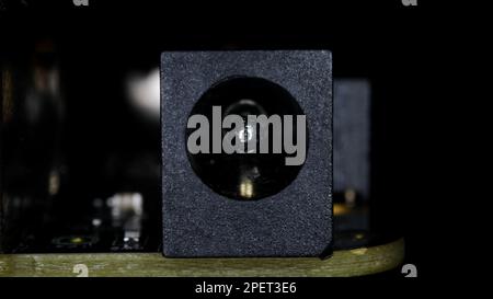 A small black audio port on the motherboard Stock Photo