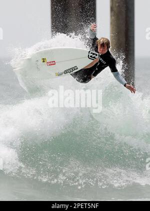 Taj Burrow of Australia catches air as he surfs the final round at the  Honda U.S. Open of Surfing, Sunday, Aug. 1, 2004, in Huntington Beach,  Calif. Burrow won the competition and