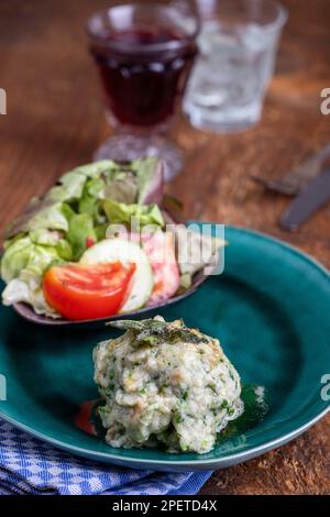 Rustic Spinach Dumpling With Salad Stock Photo