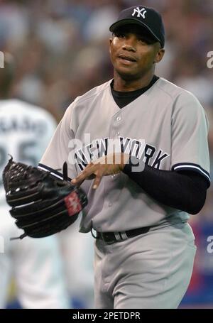 New York Yankees pitcher Orlando Hernandez delivers a pitch to the Boston  Red Sox in the first inning Friday night, Sept. 17, 2004, at Yankee Stadium  in New York. (AP Photo/Bill Kostroun