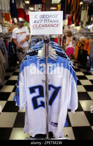 Eddie George football jerseys are seen on a clearance rack at Sports  Seasons in Hickory Hollow Mall in Nashville, Tenn., Tuesday, July 20, 2004.  The Tennessee Titans released its all-time franchise leading