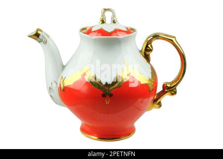 Porcelain teapot isolated on a white background. Tea pot with patterns. Stock Photo