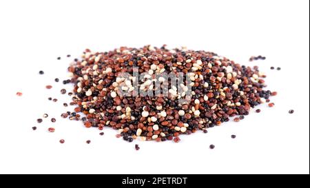 Quinoa seeds isolated on white background. Mix of white, red and black quinoa Stock Photo