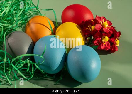 colorful eggs symbolize easter. Easter minimal concept. Creative Happy Easter, spring layout. Stock Photo