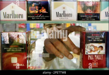 singapore cigarette pack S'pore to sell cigarettes in