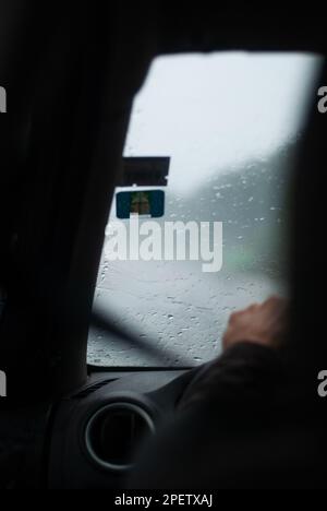 Rainy weather, landscape through the window of a car Stock Photo - Alamy