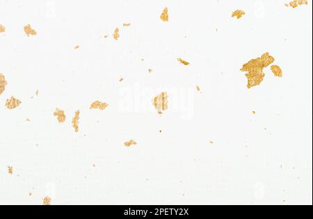Paper with gold sheet texture as background. Stock Photo