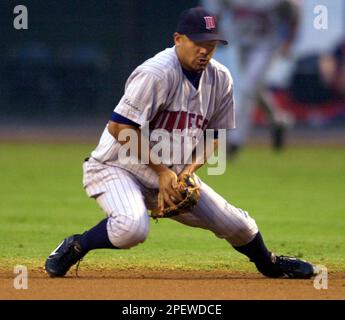 Arizona Diamondbacks Luis Gonzalez waves to some Colorado Rockies warming  up prior to start of four-game series at Coors Field in Denver August 14,  2006. (UPI Photo/Gary C. Caskey Stock Photo 