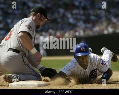 Chicago Cubs' Corey Patterson, right, celebrates with Michael