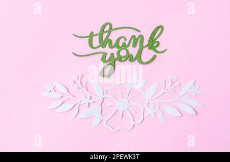 Thank you text with butterfly paper carve on pastel background. Stock Photo