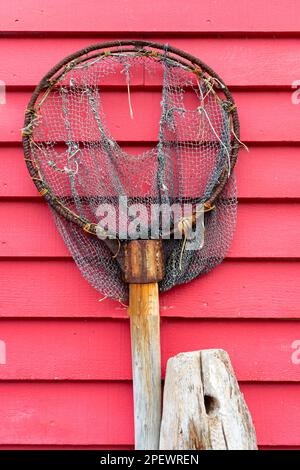 Old torn fishing net hanging hi-res stock photography and images - Alamy