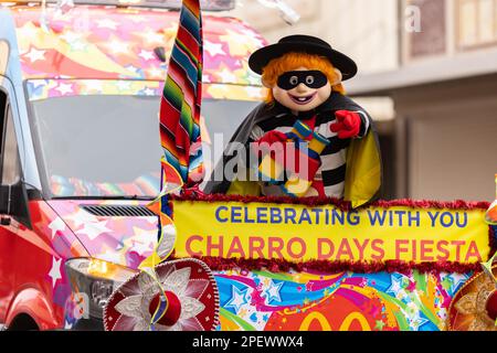 Brownsville, Texas, USA - February 26, 2022: Charro Days Grand International Parade, Hamburglar, McDonalds mascot, celebrating at the parade Stock Photo