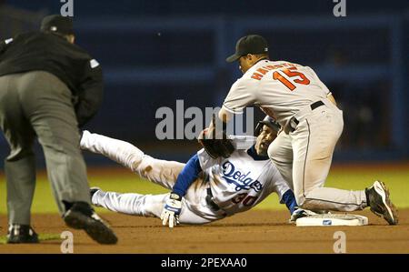 Baltimore Orioles second baseman Jerry Hairston watches as New