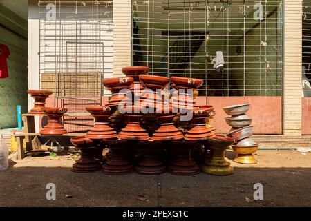 Yangon, Myanmar - Dec 19, 2019: Various clay pots, stacked on top of each other, near Botahtaung Pagoda, in Yangon, Burma, Myanmar Stock Photo