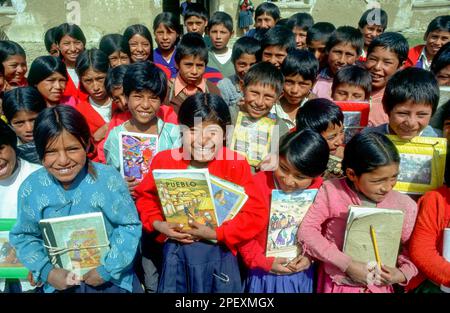 Bolivia, Potosi area. Primary school children in front of their  primary school building. Stock Photo