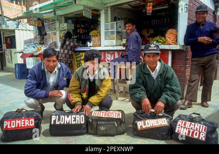 Bolivia, Sucre. Unemployed men waiting for a job. Stock Photo