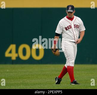 Boston Red Sox outfielder Trot nixon jogs to first base after