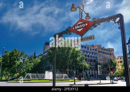 Madrid, Spain Alonso Martinez Metro Station with logo day view at Plaza de Santa Barbara with fountain. Stock Photo