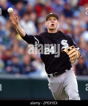 Seattle Mariners' Edgar Martinez watches his sacrifice fly to right field  in the seventh inning against the Oakland Athletics, Friday, Sept. 17,  2004, at Safeco Field in Seattle. The RBI, which scored