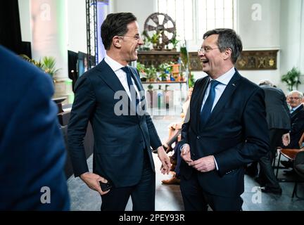 THE HAGUE - (VLNR) Prime Minister Mark Rutte, and former Prime Minister Jan Peter Balkenende, during Verhagen's farewell as chairman of Bouwend Nederland. He has been at the helm of the interest group for the construction sector for almost ten years. ANP BART MAAT netherlands out - belgium out Stock Photo