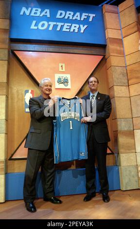 Russ Granik, deputy commissioner of the NBA, left, and Washington Wizards  owner Abe Pollin, right, announce during a news conference at the MCI  Center in Washington, Saturday, Dec. 4, 1999, that the