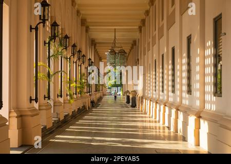 Yangon, Myanmar - Dec 19, 2019: Elegant gallery and corridor on Strand Rd, of the popular The Heritage Hotel, Yangon, Burma, Myanmar Stock Photo