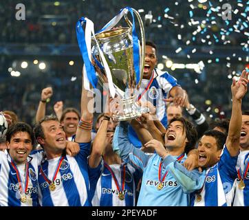 Porto players celebrate as they lift the trophy after beating