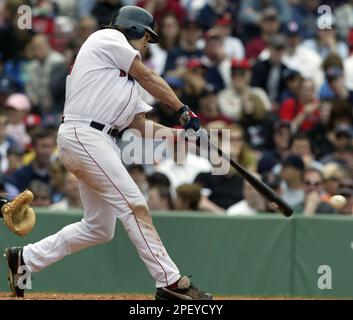 Photo: JOHNNY DAMON OF THE BOSTON RED SOX BREAKS HIS BAT ON PITCH