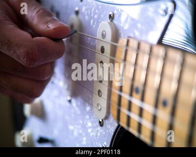 Man playing guitar close-up Stock Photo