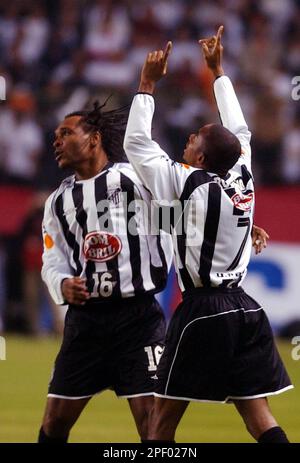 Robinho, right, of Santos of Brazil celebrates his goal against