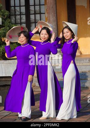 Vietnamese mother and daughter in Ao Dai Traditional dress, celebrate