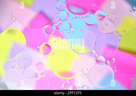 Abstract bright background, oil circles on the water surface Stock Photo