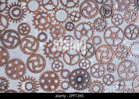 Lot of metal gears gray background Stock Photo