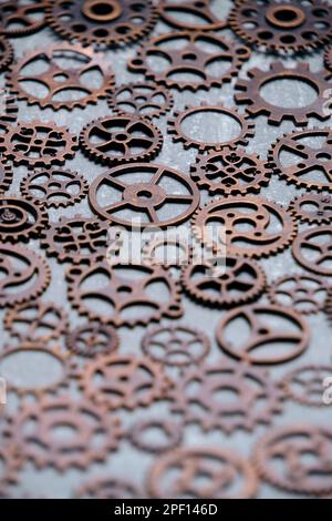 Lot of metal gears gray background Stock Photo