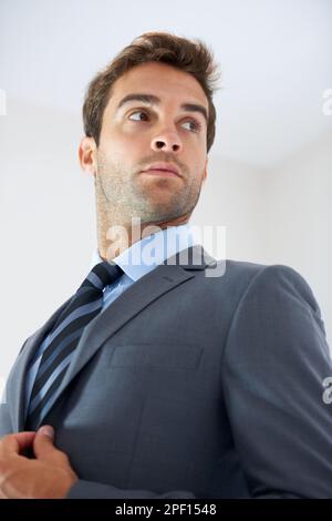 The modern professional. a handsome young businessman at work. Stock Photo