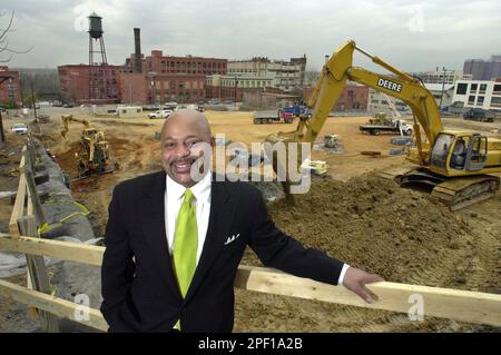 ** FILE ** Johnny Johnson of Community Pride Stores, at the site at 25th  and Main Streets in Richmond, Va. where his latest store , The Market at  Tobacco Row, was under construction March 12, 2002. Johnson was once the  largest minority grocer in the 