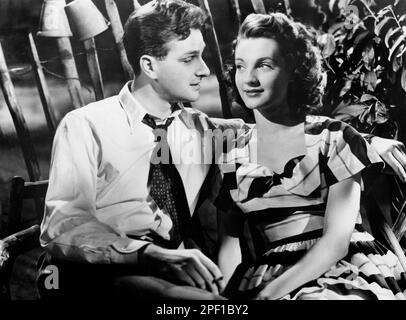 Paul Dupuis, Barbara Murray, on-set of the British Film, 'Passport To Pimlico', General Film Distributors, 1949 Stock Photo