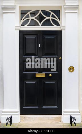 Door of 11 Downing Street, official residence of the Chancellor of the Exchequer (UK finance minister) Westminster, London, UK Stock Photo
