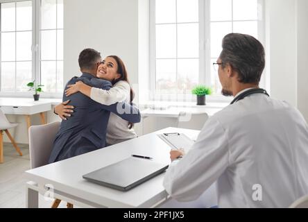 Young married couple are happy, they will soon become parents. Stock Photo