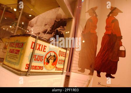 dixie queen tobacco tin A Dixie Queen Tobacco Tin, from the 1880s, is displayed in the 
