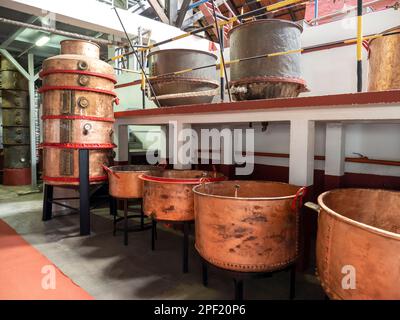 Copper vats in a Rum factory that used Sugar Cane to ferment, in Porto Da Cruz, Madeira. Stock Photo
