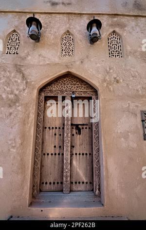 door in the old abandoned village of Al Munisifeh, Ibra, Oman Stock Photo